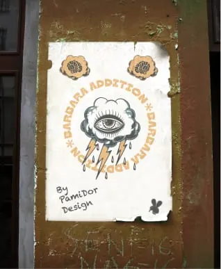 A Barbara Addiction eye print pasted on a weathered door