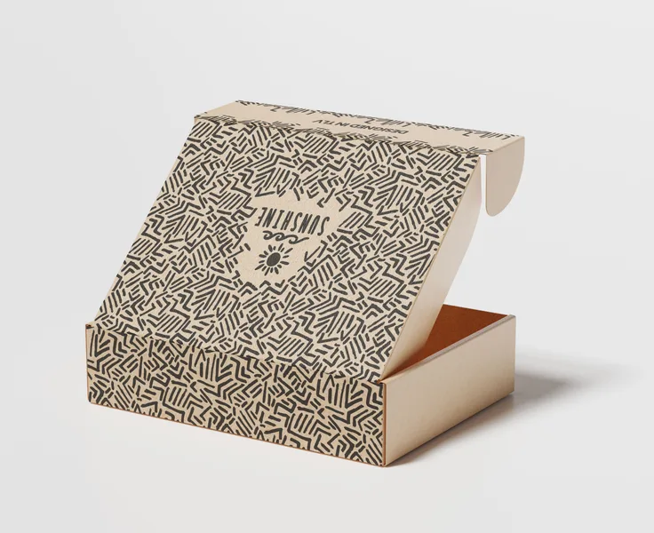 An open mailer box printed edge to edge with a black scribble pattern