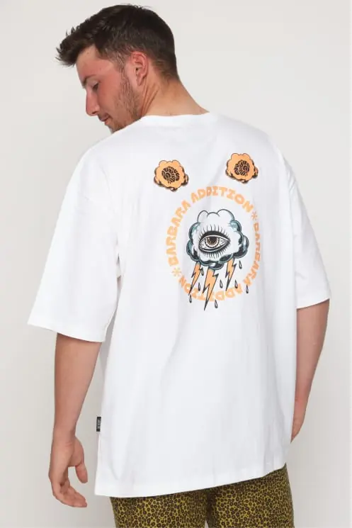 White tee worn from behind, eye and floral back print