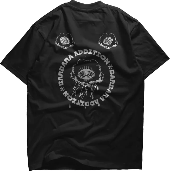 Black tee with an eye ringed by circular lettering
